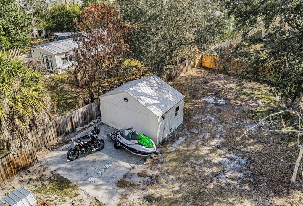 515 Walnut Street Auburndale, FL 33823 - Photo 27 of 45 a pathway of a house with a yard