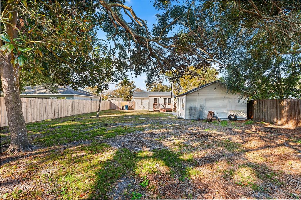515 Walnut Street Auburndale, FL 33823 - Photo 27 of 43 a view of a house with a yard