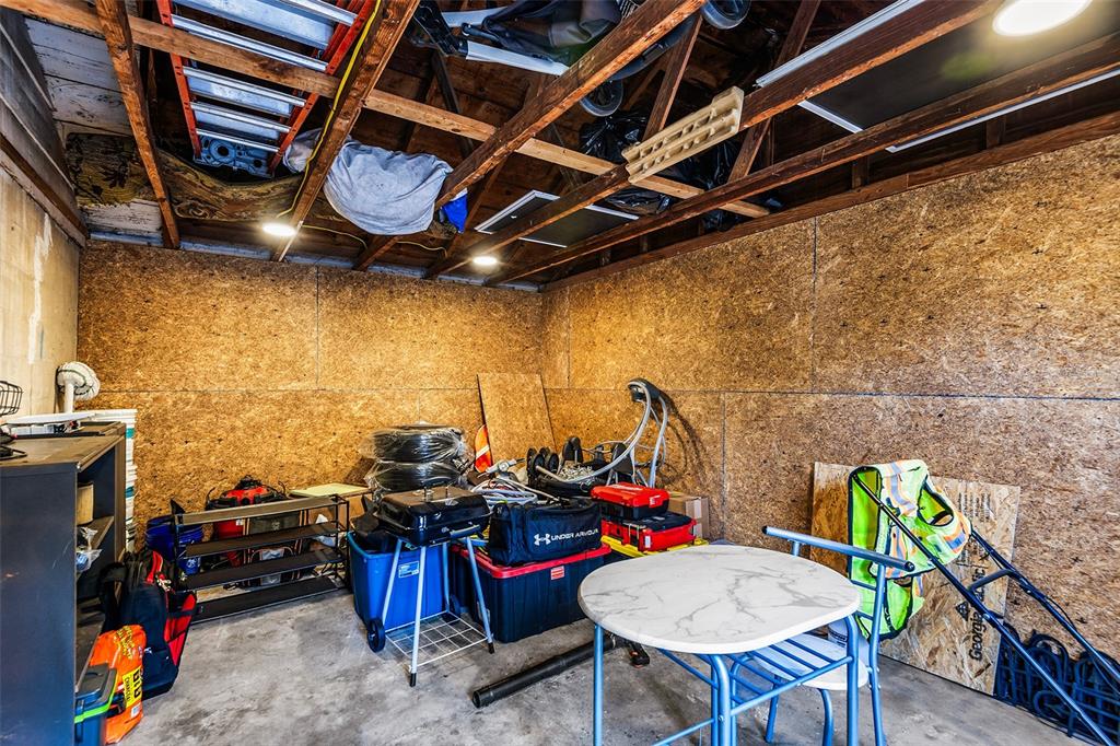 515 Walnut Street Auburndale, FL 33823 - Photo 30 of 45 a view of a storage room with furniture