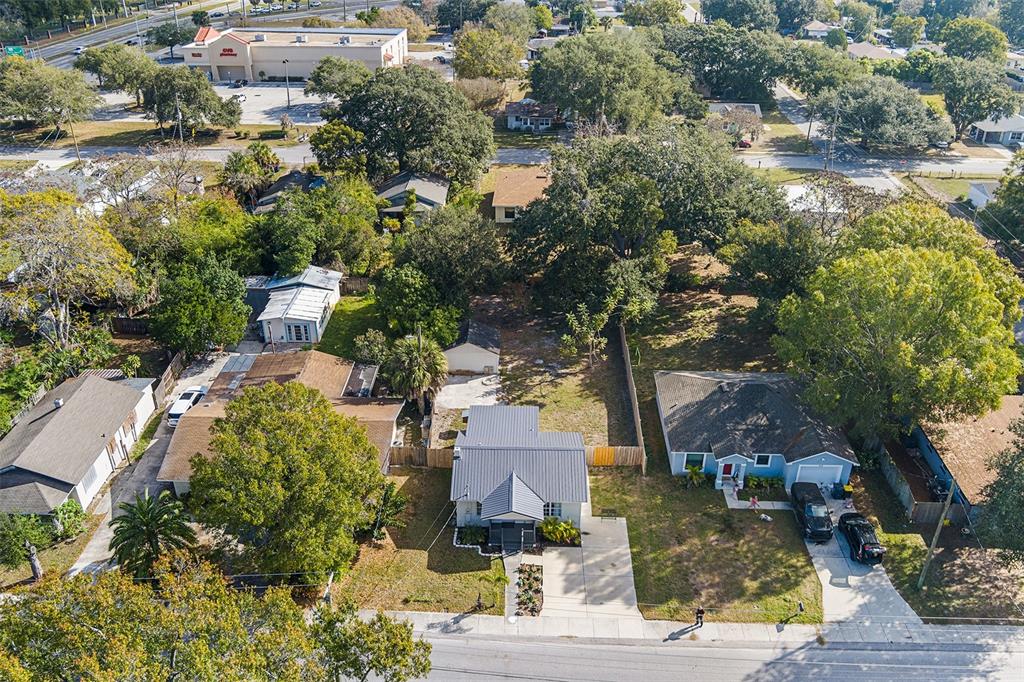 515 Walnut Street Auburndale, FL 33823 - Photo 33 of 45 an aerial view of residential houses with outdoor space and trees