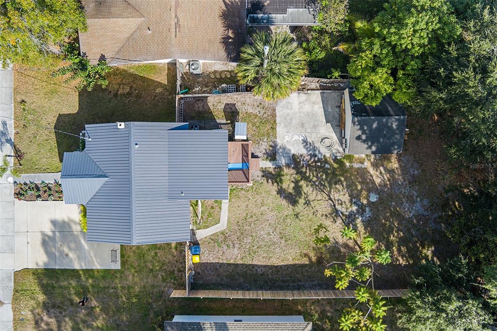 515 Walnut Street Auburndale, FL 33823 - Photo 34 of 45 an aerial view of a house with a yard