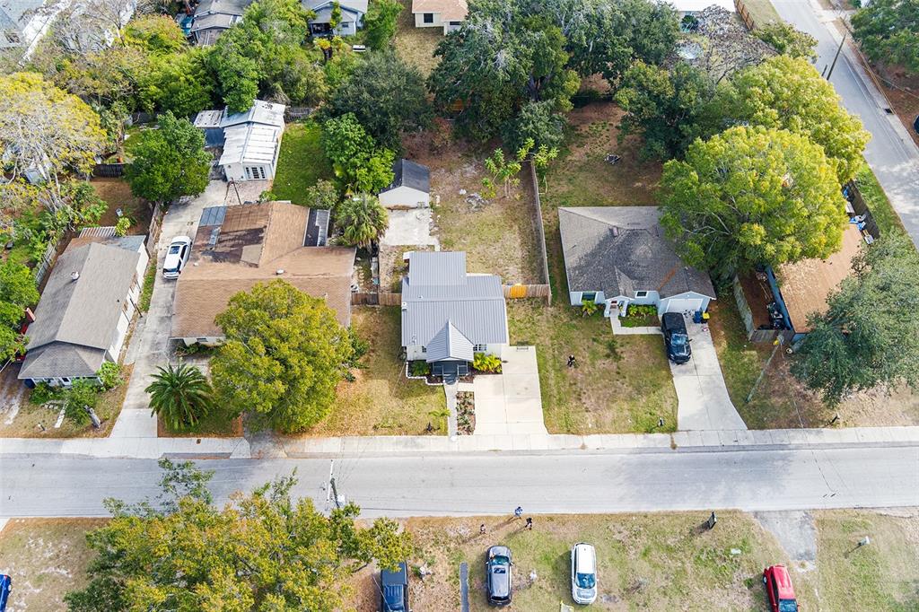 515 Walnut Street Auburndale, FL 33823 - Photo 36 of 45 an aerial view of residential houses with outdoor space