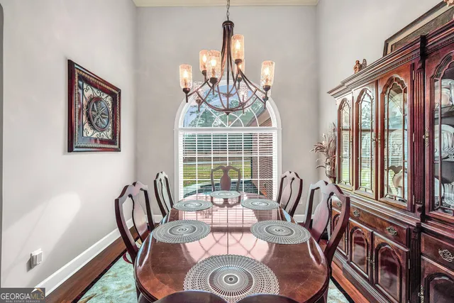 a living room with furniture fireplace and flat screen tv