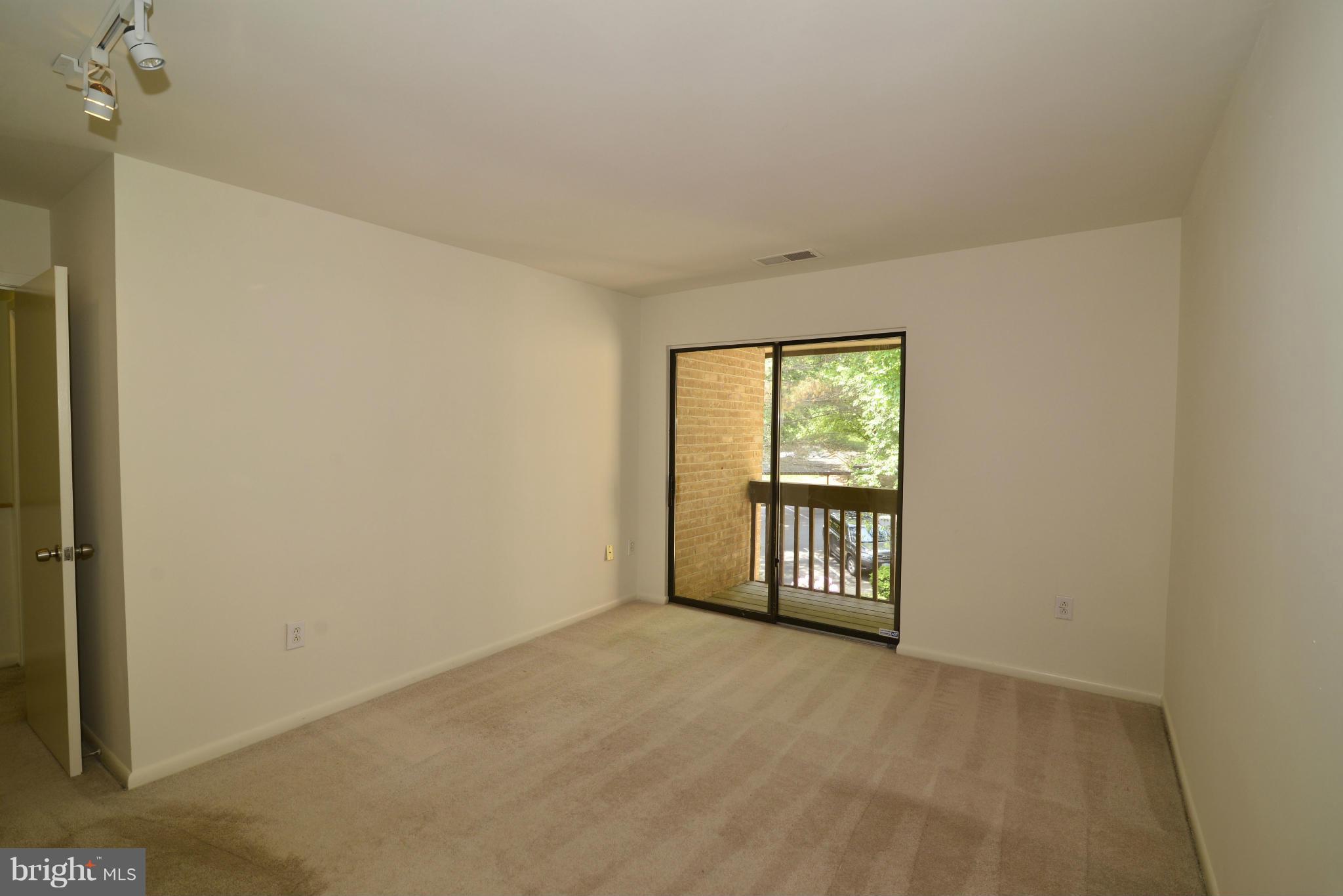 11212 Lagoon Lane Reston, VA 20191 - Photo 17 of 24 Bedroom #2 enjoys a private balcony.