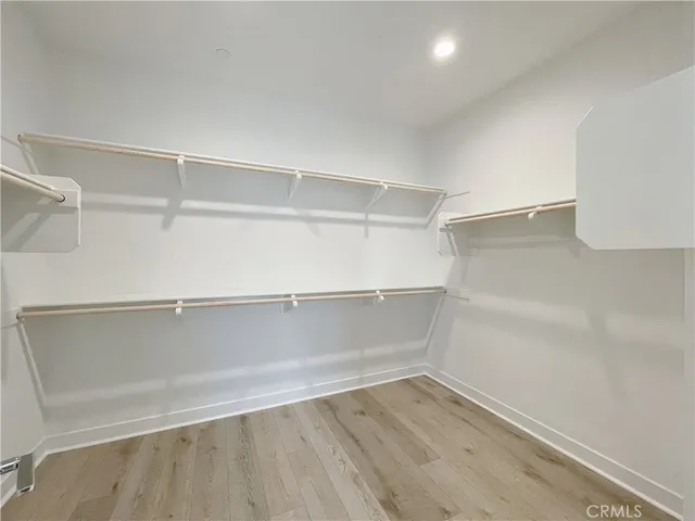 a view of an empty walk in closet