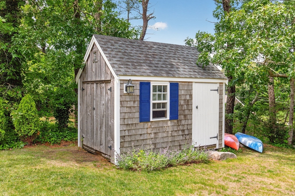 50 Pine Ridge Road Chatham, MA 02633 - Photo 5 of 42 a view of front of house with a yard