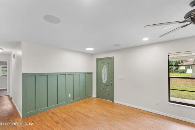 a view of a hallway with entryway