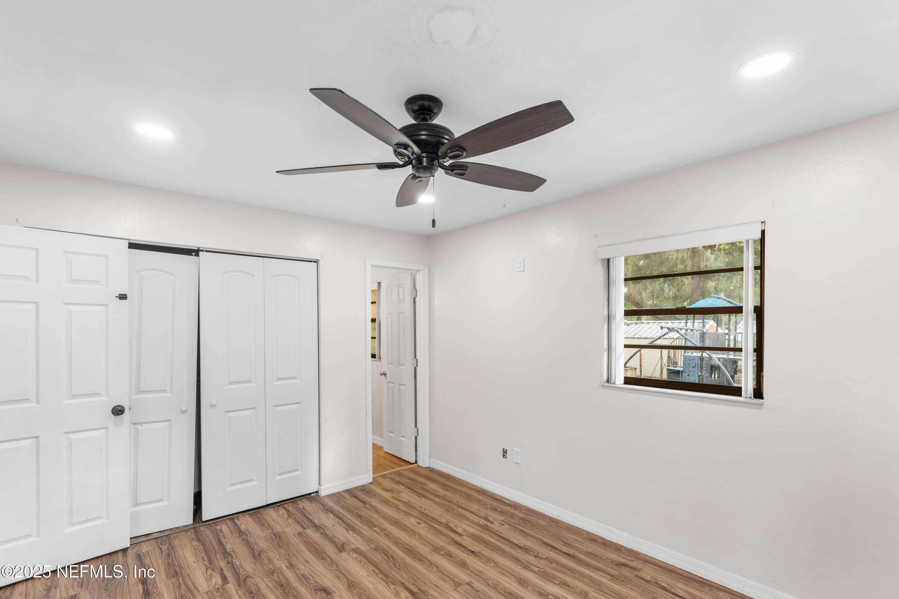 220 Southwest Grove Street Keystone Heights, FL 32656 - Photo 22 of 41 a view of an empty room with a window