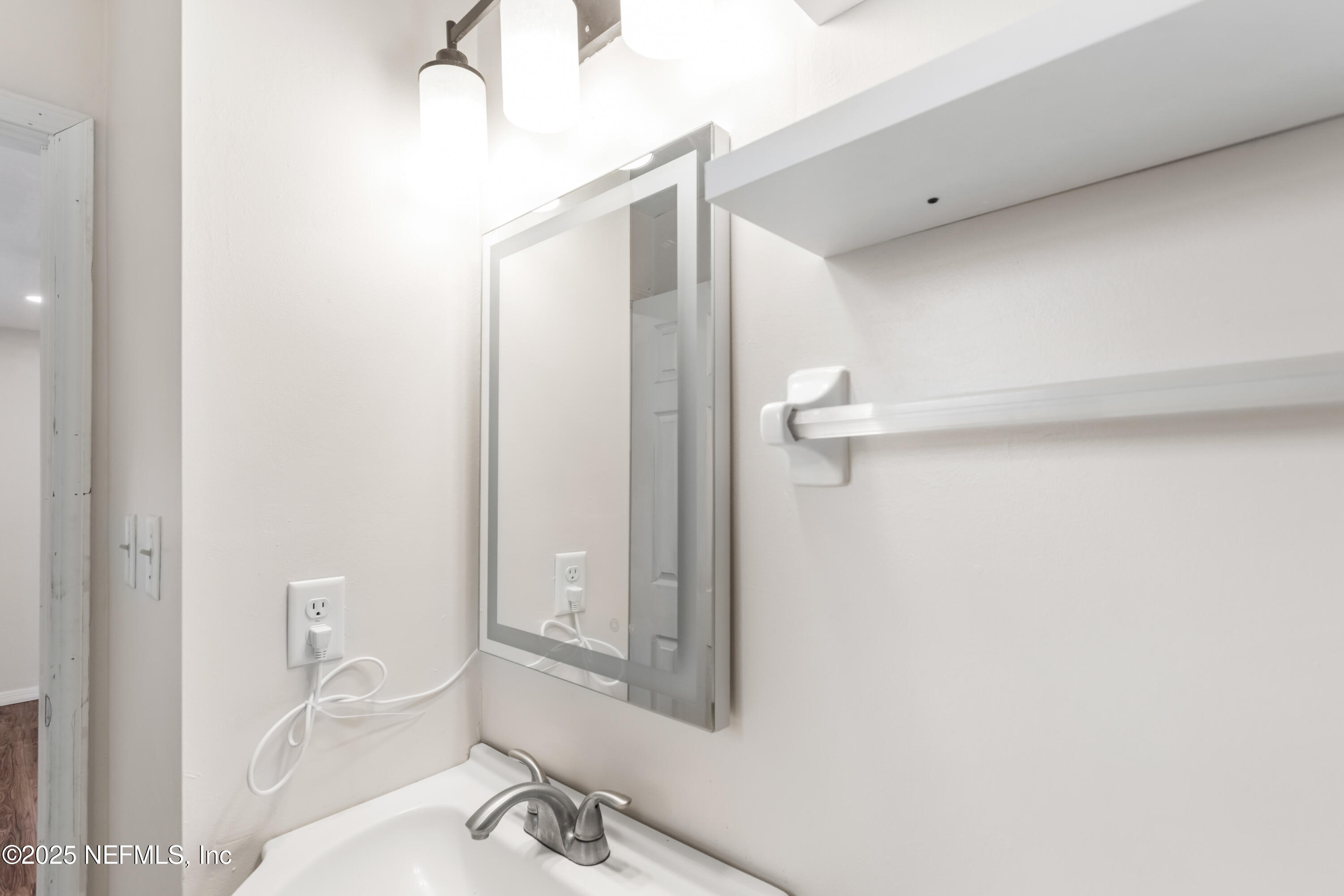 220 Southwest Grove Street Keystone Heights, FL 32656 - Photo 25 of 41 a bathroom with a sink a toilet and shower