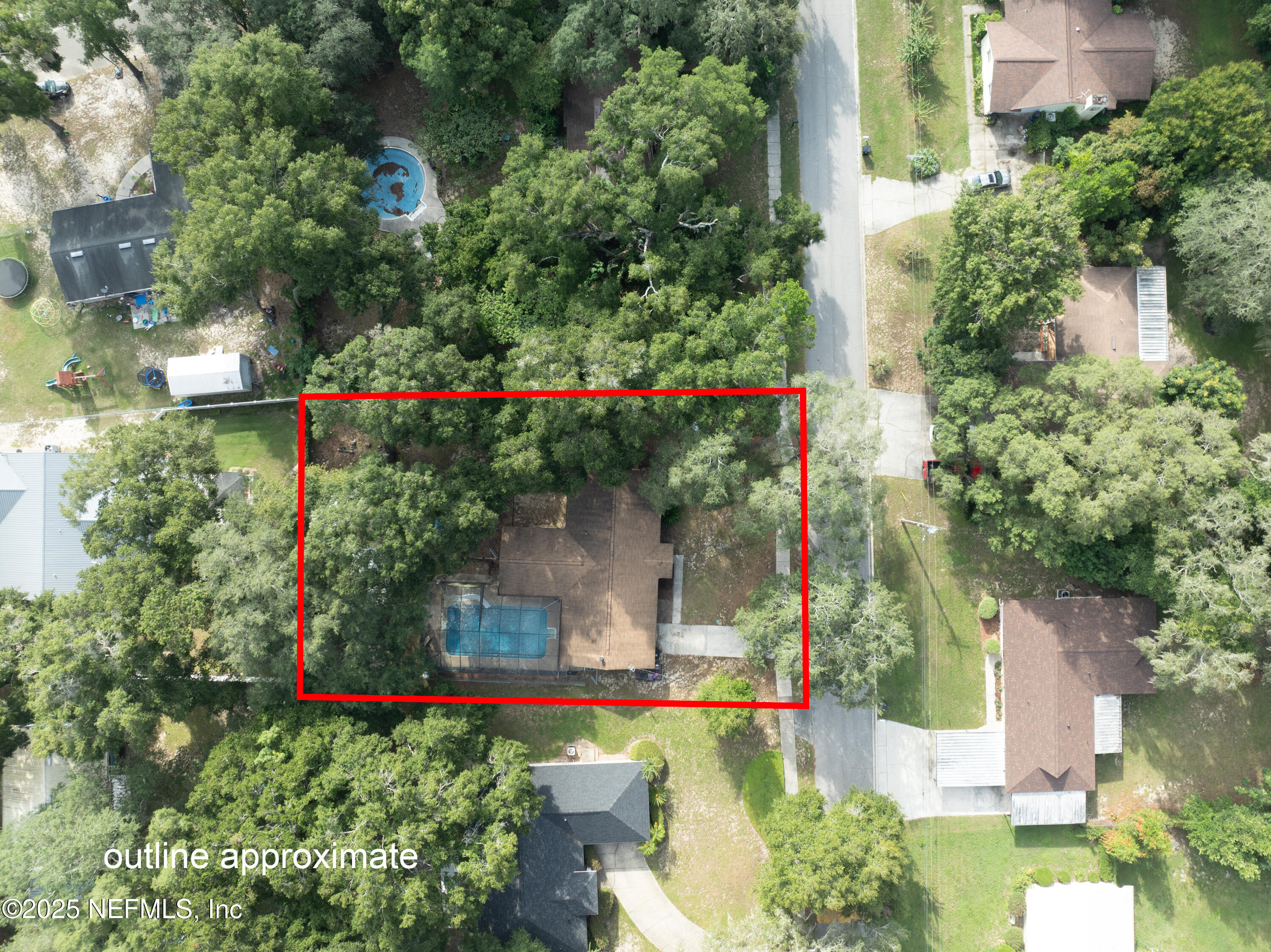 220 Southwest Grove Street Keystone Heights, FL 32656 - Photo 39 of 41 an aerial view of a house with a yard and garden