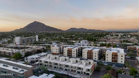 a view of city with tall buildings