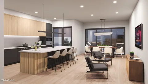 a living room with furniture a flat screen tv and a window