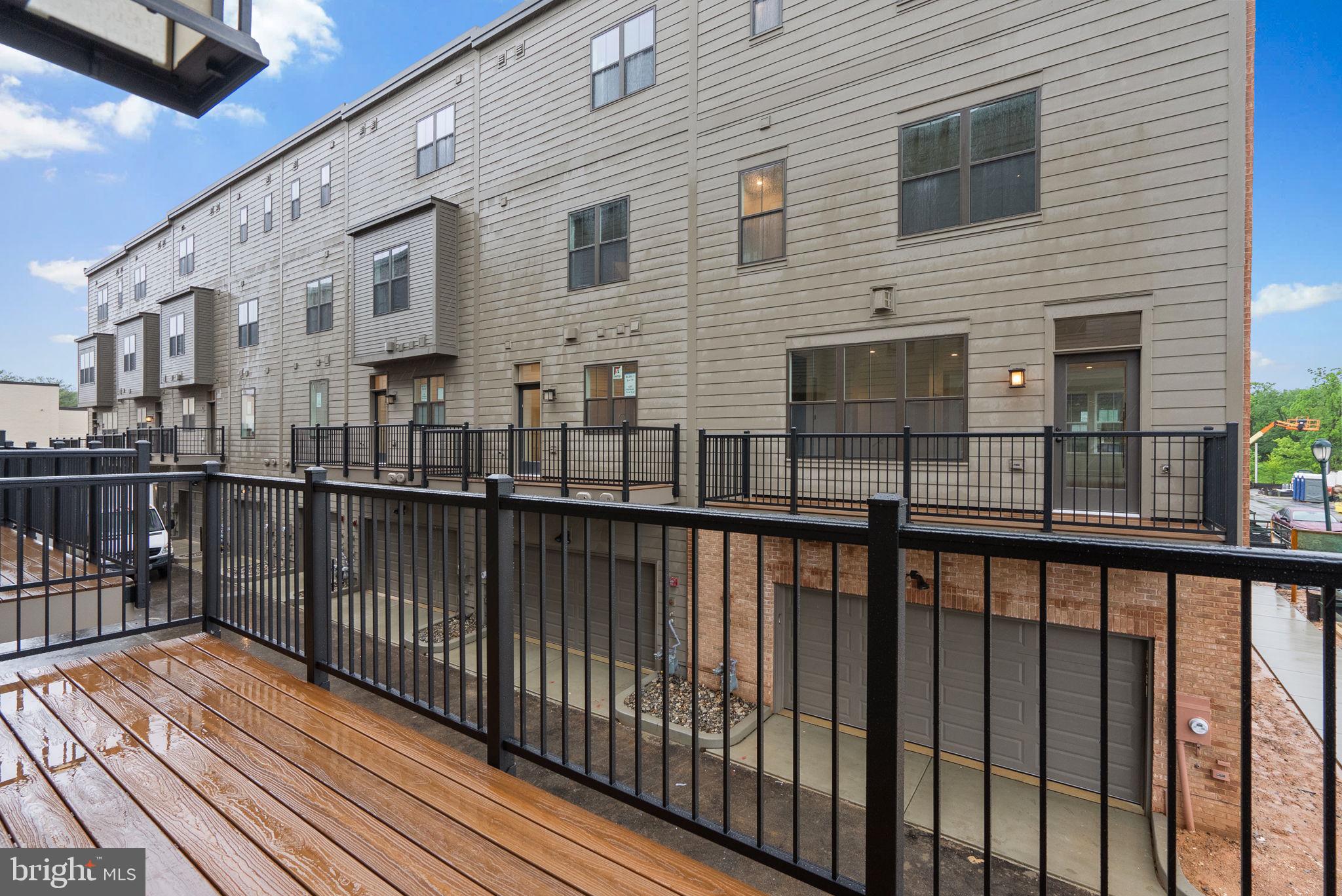 1121 Polaris Road Potomac, MD 20854 - Photo 14 of 51 a view of a brick building from a balcony