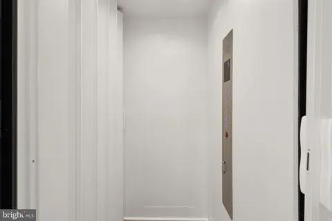 a view of a brick building from a balcony