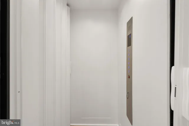 a view of a brick building from a balcony