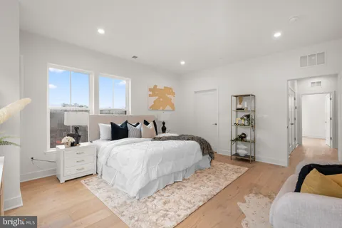 a bed room with a bed and a couch