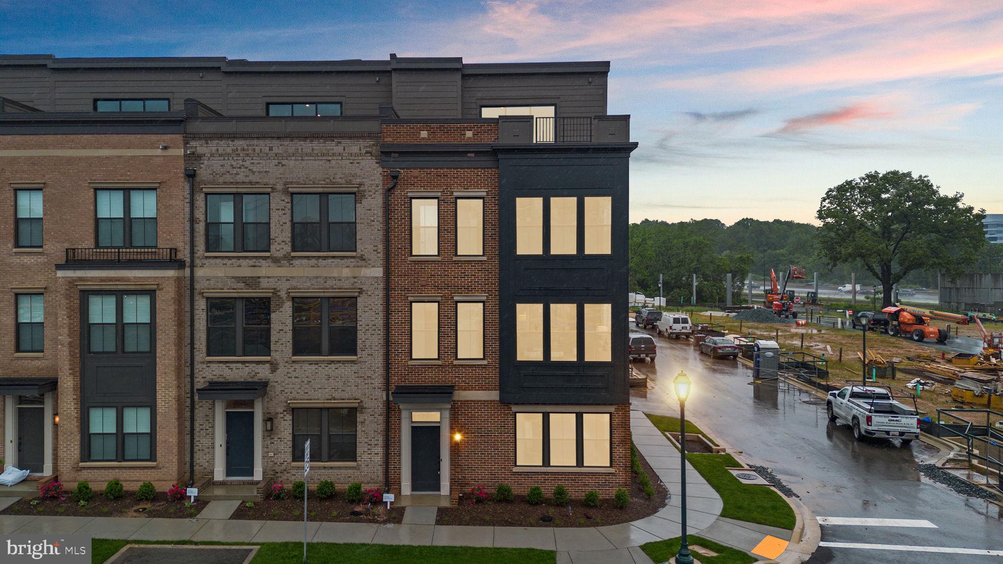 1121 Polaris Road Potomac, MD 20854 - Photo 2 of 51 a city view with tall buildings and a cars park