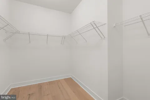 a view of a room with racks on the wall