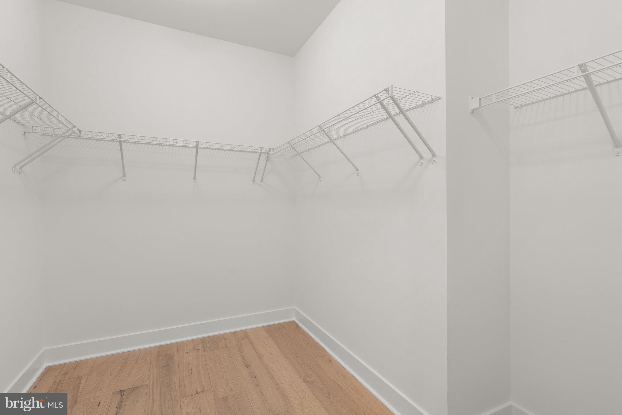 1121 Polaris Road Potomac, MD 20854 - Photo 21 of 51 a view of a room with racks on the wall
