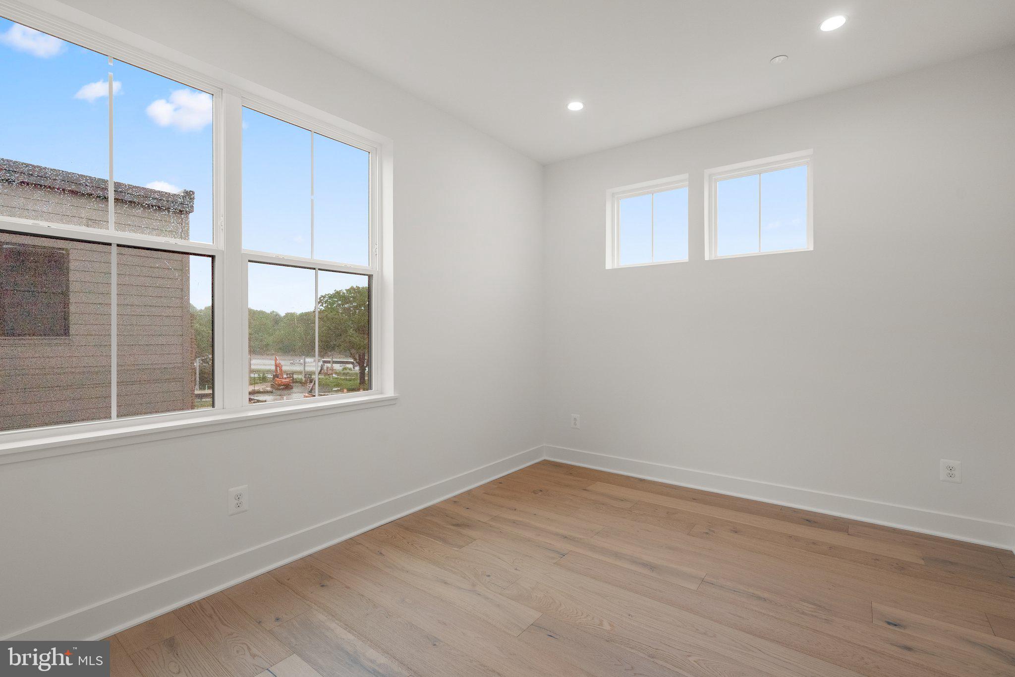 1121 Polaris Road Potomac, MD 20854 - Photo 29 of 51 a view of empty room with wooden floor and fan