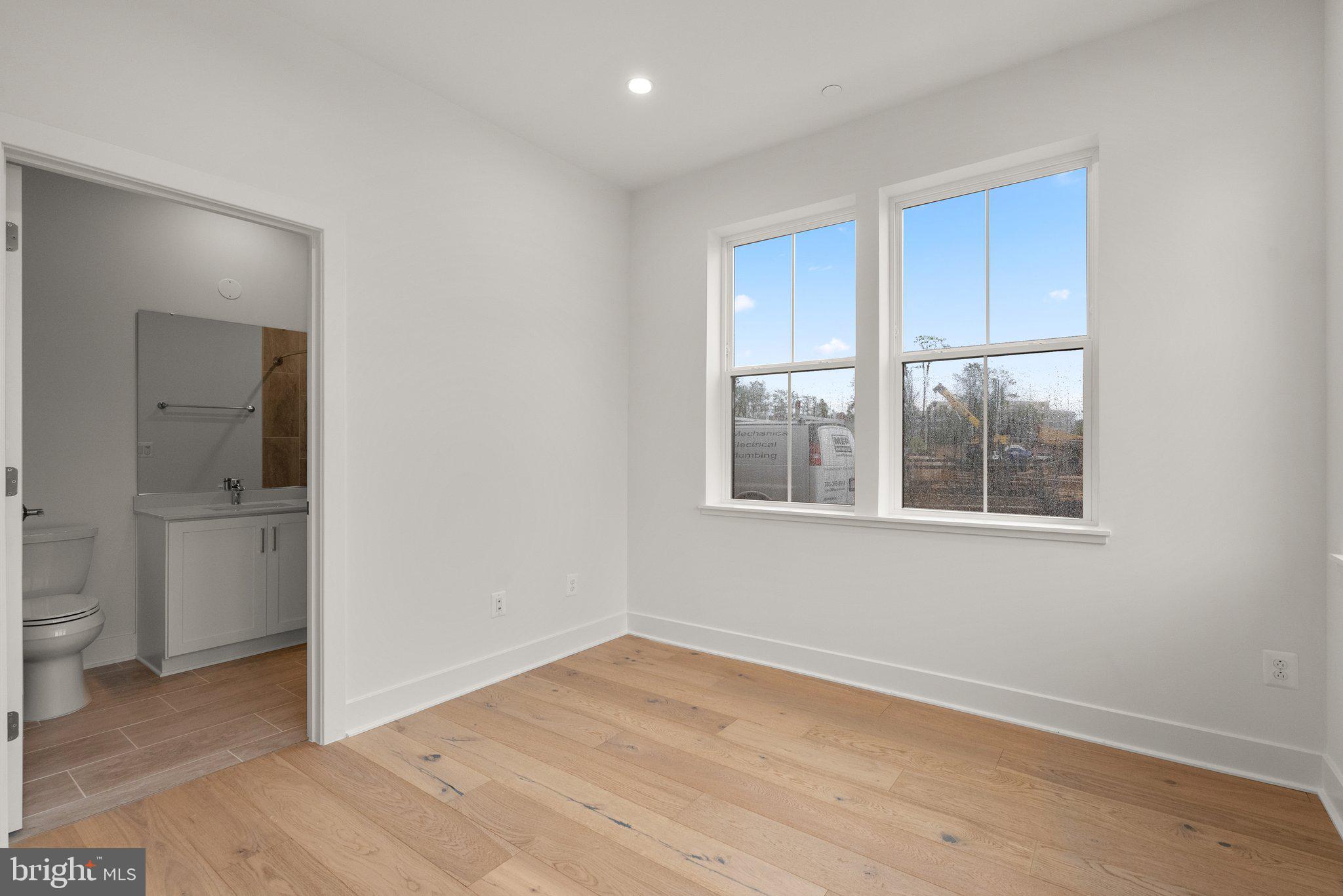 1121 Polaris Road Potomac, MD 20854 - Photo 32 of 51 a view of an empty room with a window and bathroom