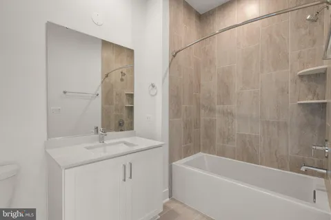 a bathroom with a sink and a bathtub
