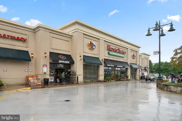 a view of a building with sitting area