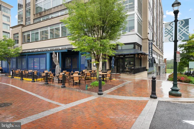 a view of a building with sitting area