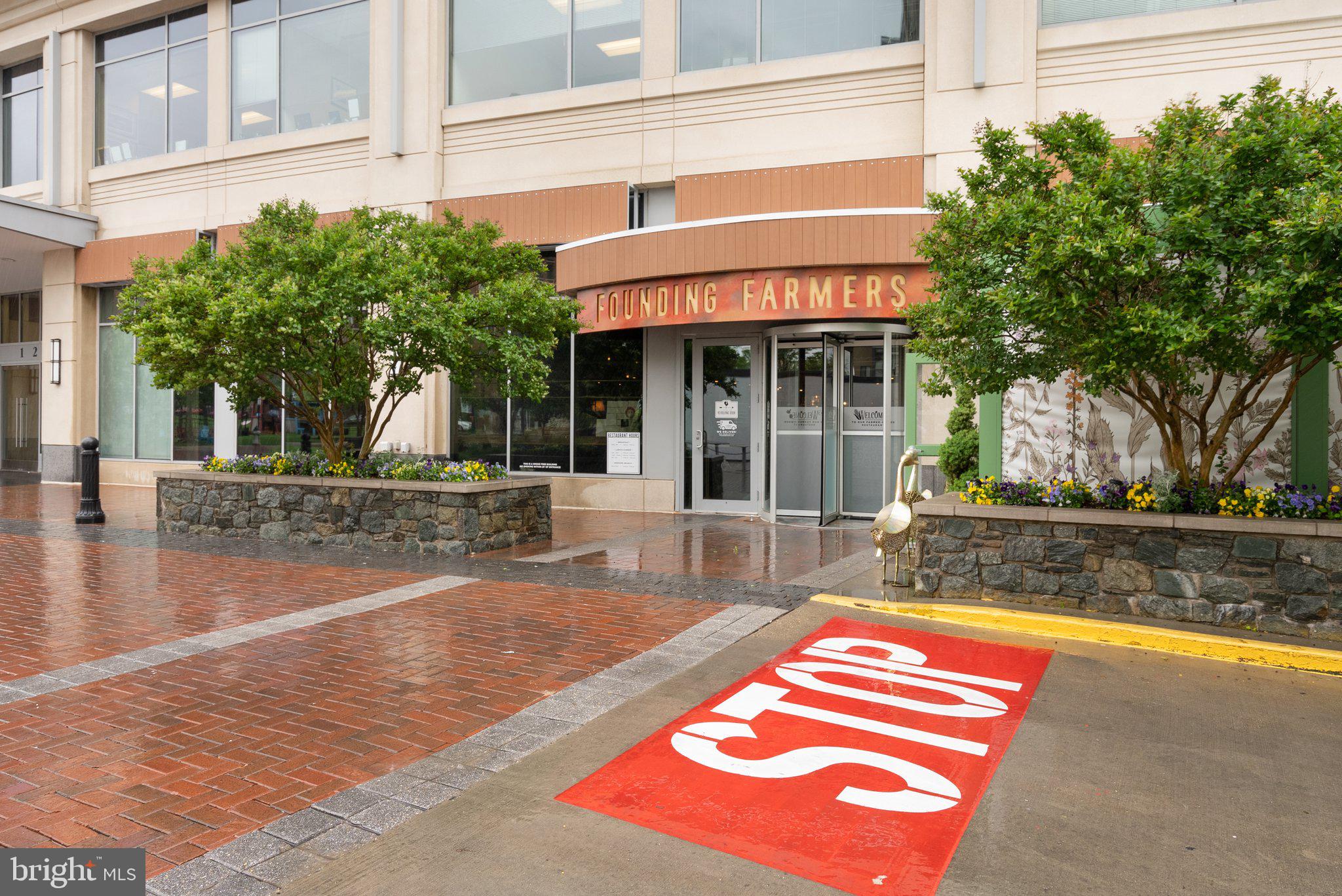 1121 Polaris Road Potomac, MD 20854 - Photo 44 of 51 a view of a house with a swimming pool and sitting area