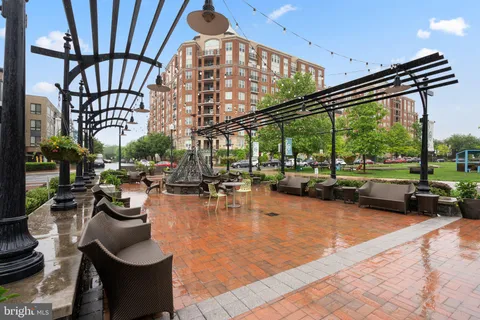 a view of swimming pool with outdoor seating