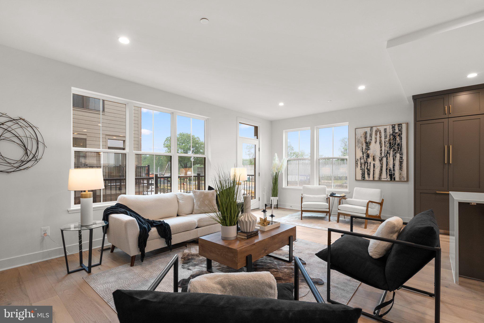1121 Polaris Road Potomac, MD 20854 - Photo 8 of 51 a living room with furniture and a large window