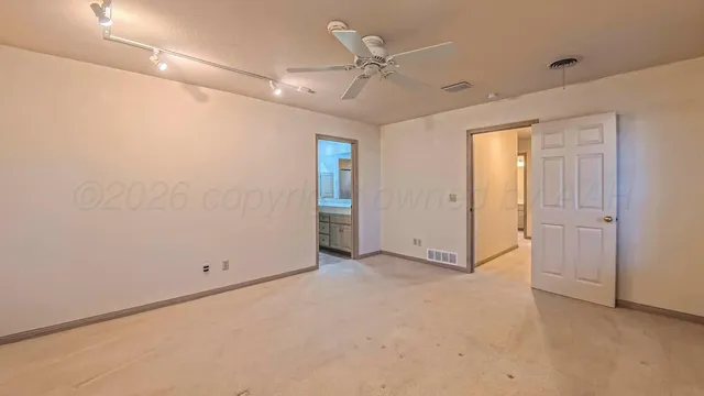 a bathroom with a granite countertop sink mirror and double