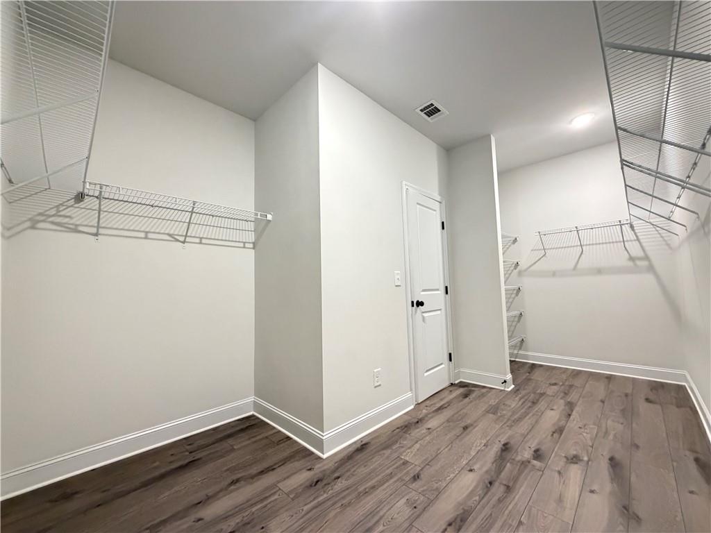 1545 Dahlia Drive Cumming, GA 30040 - Photo 35 of 50 a view of small space with wooden floor