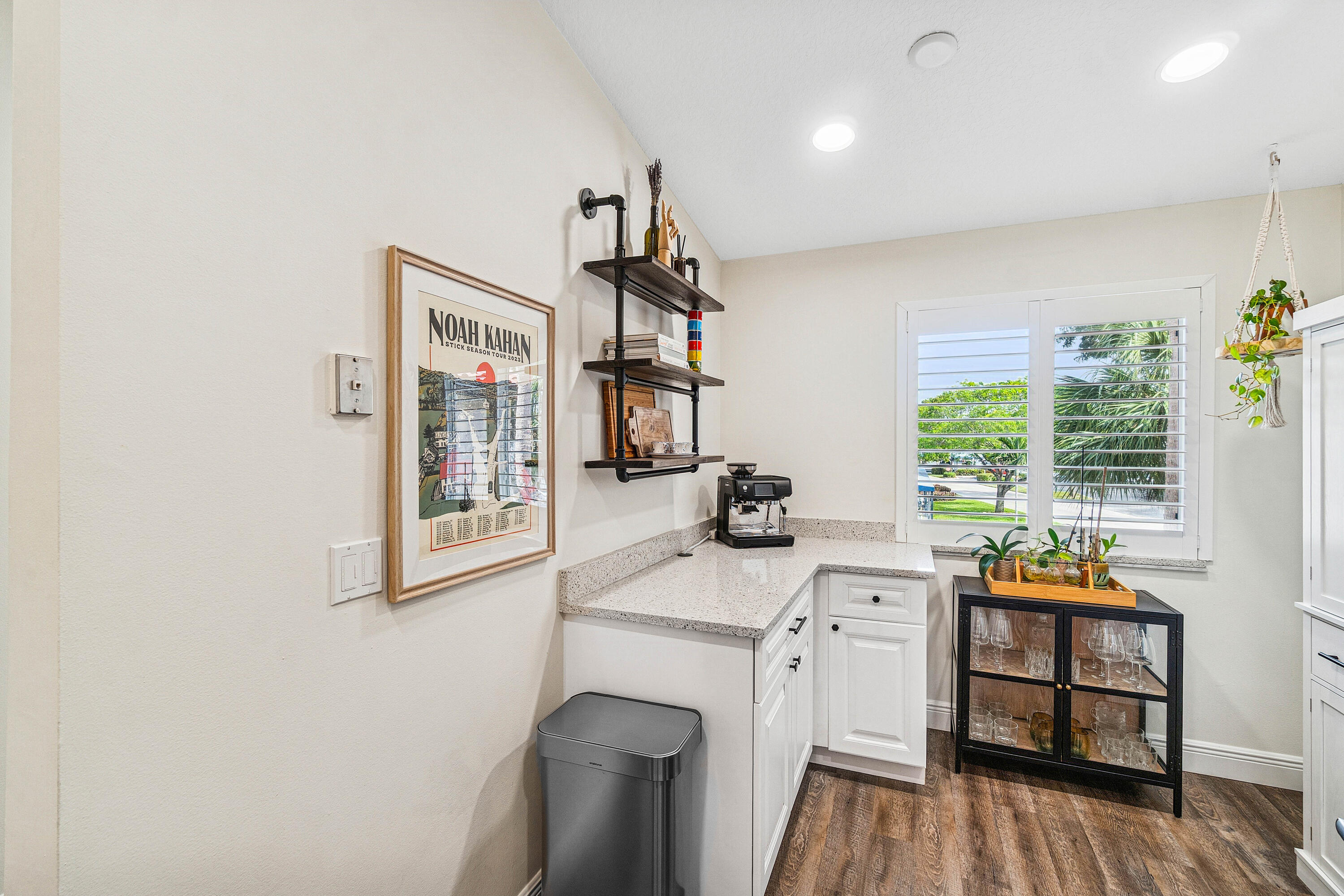 340 Northwest 67th Street, Unit 202 Boca Raton, FL 33487 - Photo 15 of 39 a view of a workspace with furniture and a window