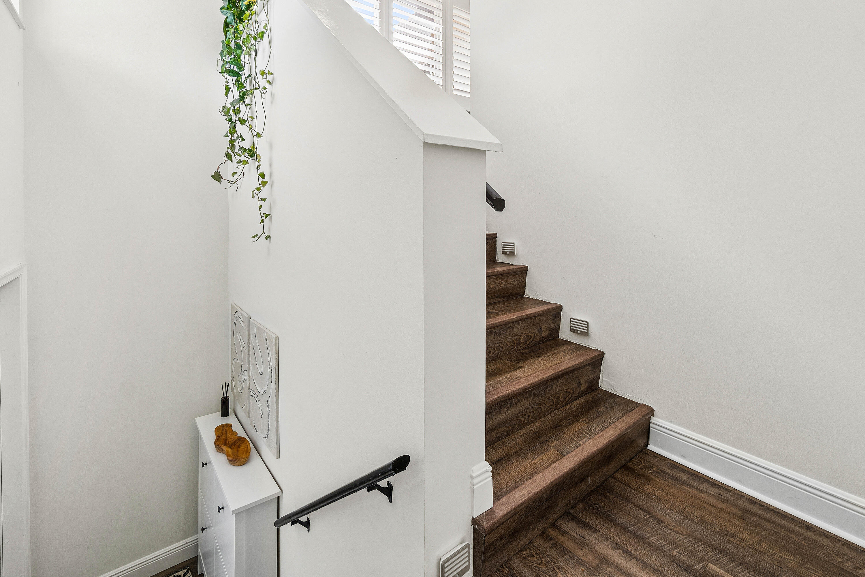 340 Northwest 67th Street, Unit 202 Boca Raton, FL 33487 - Photo 28 of 39 a view of entryway with wooden floor