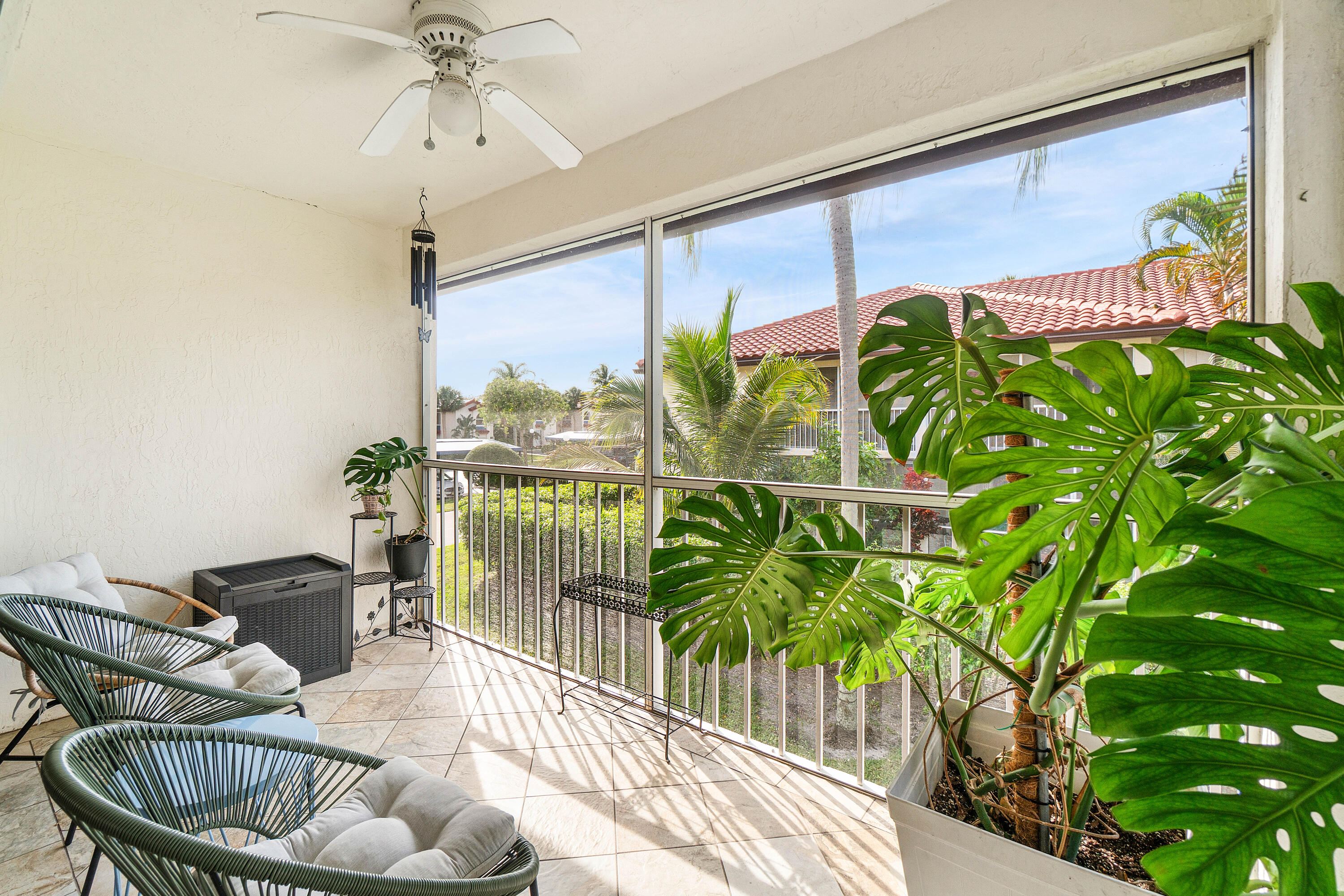 340 Northwest 67th Street, Unit 202 Boca Raton, FL 33487 - Photo 31 of 39 a living room with furniture