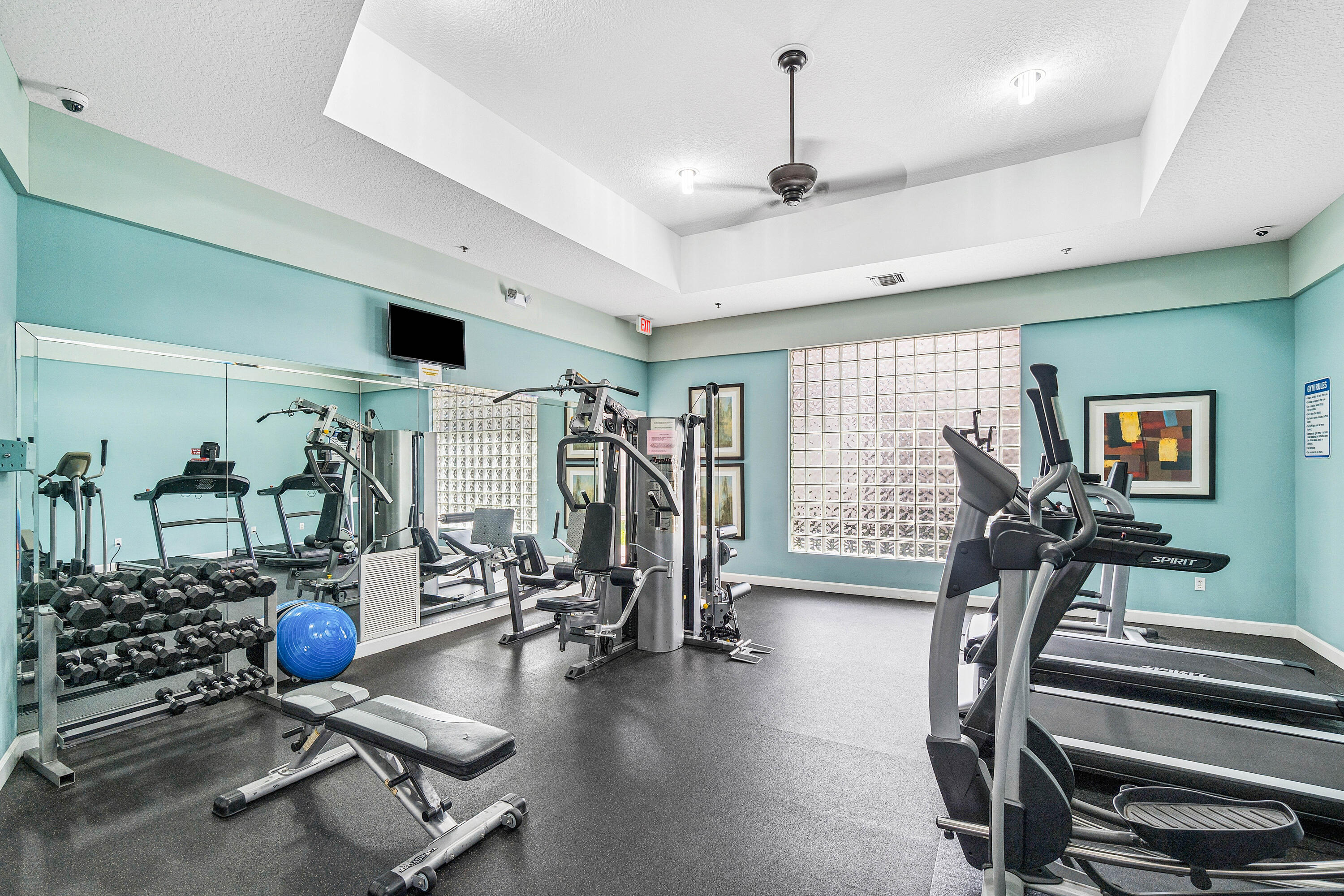 340 Northwest 67th Street, Unit 202 Boca Raton, FL 33487 - Photo 36 of 39 a view of a room with gym equipment