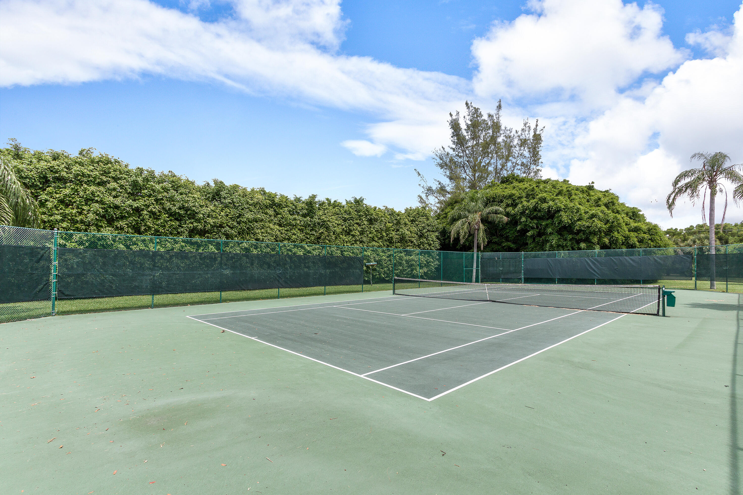 340 Northwest 67th Street, Unit 202 Boca Raton, FL 33487 - Photo 39 of 39 a view of a tennis court