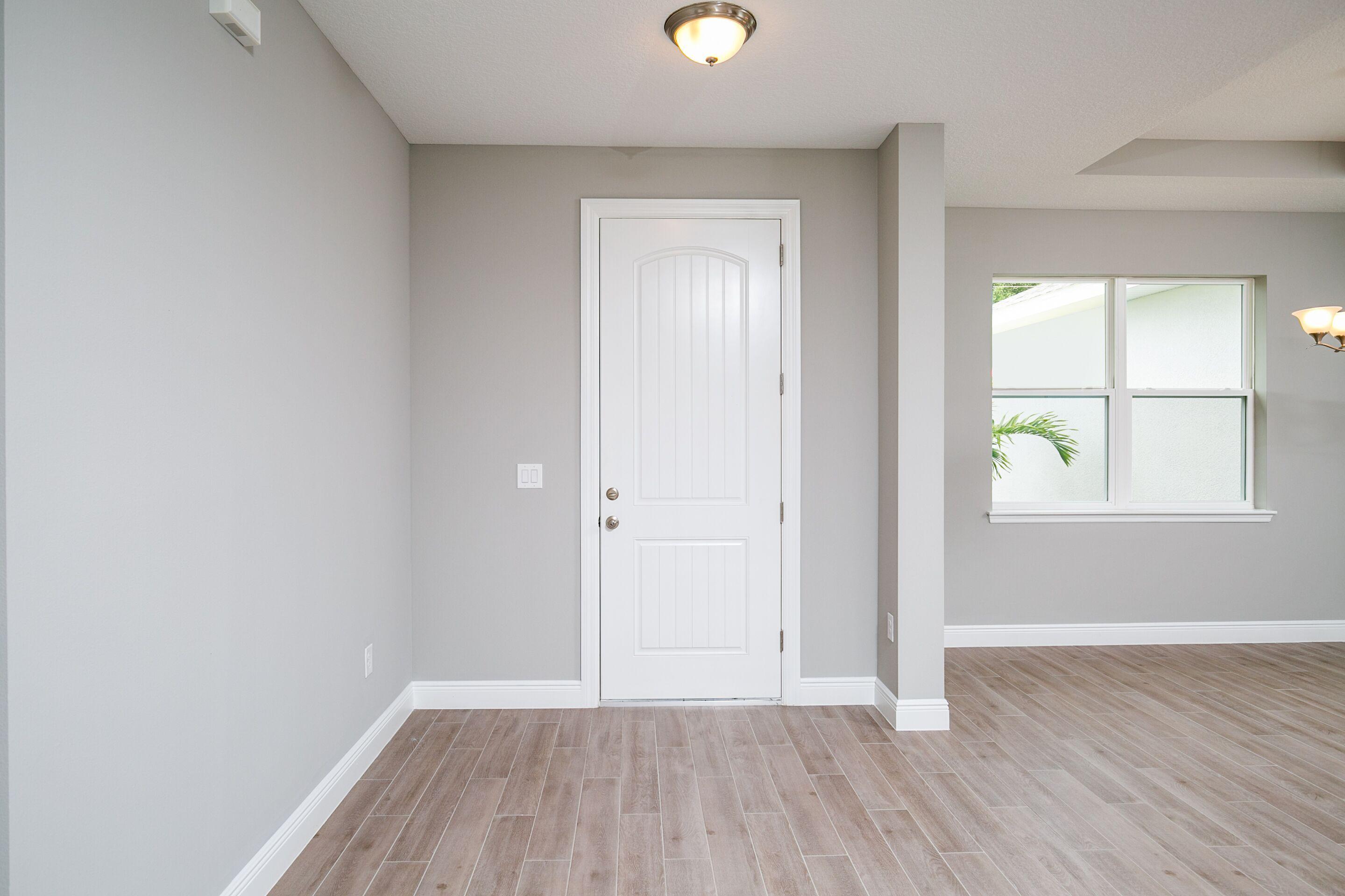 1214 Southwest Chase Road Port St. Lucie, FL 34953 - Photo 15 of 19 foyer