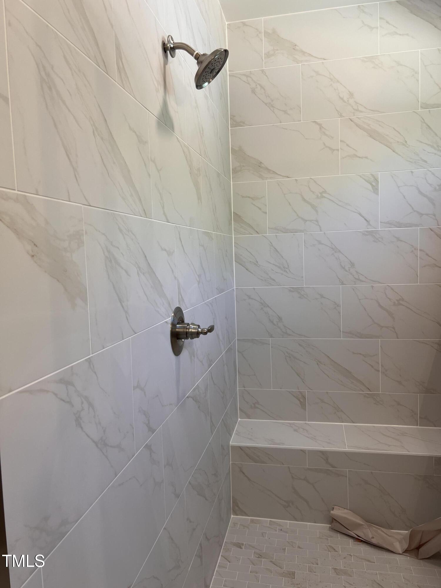 987 Lewis Road Zebulon, NC 27597 - Photo 11 of 13 a bathroom with a shower
