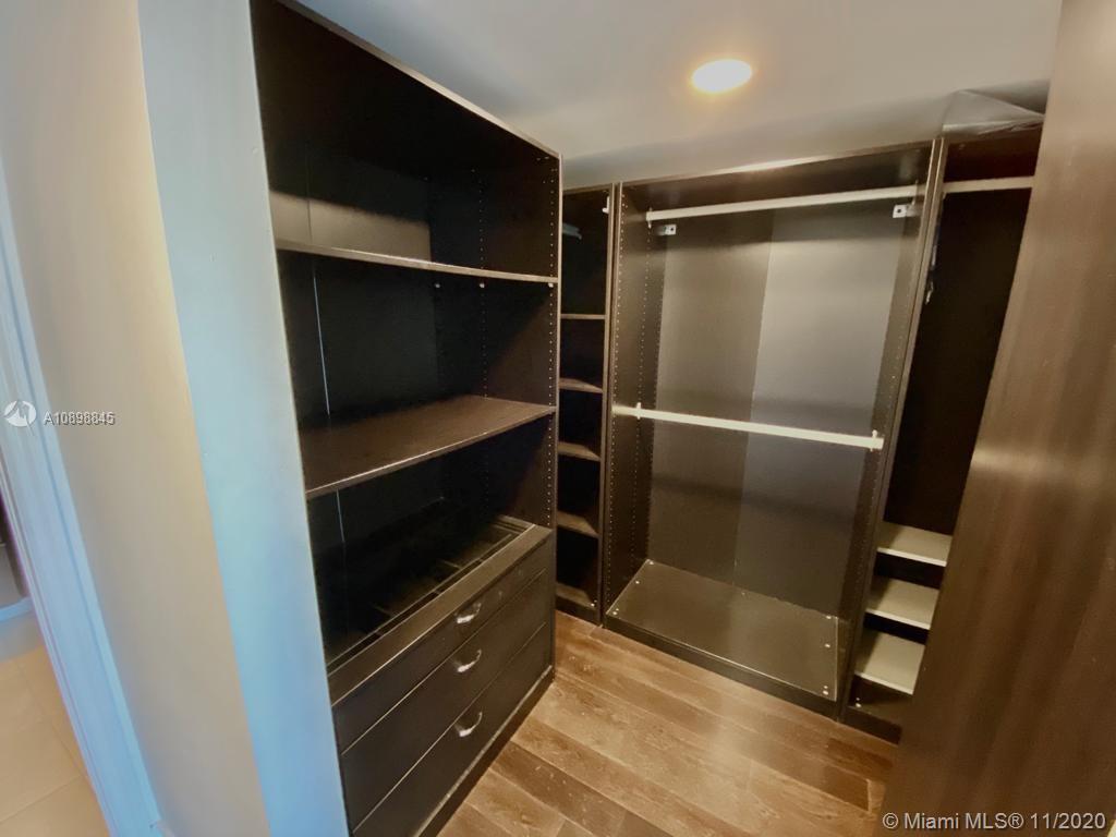 2101 Brickell Avenue, Unit 2002 Miami, FL 33129 - Photo 14 of 26 a walk in closet