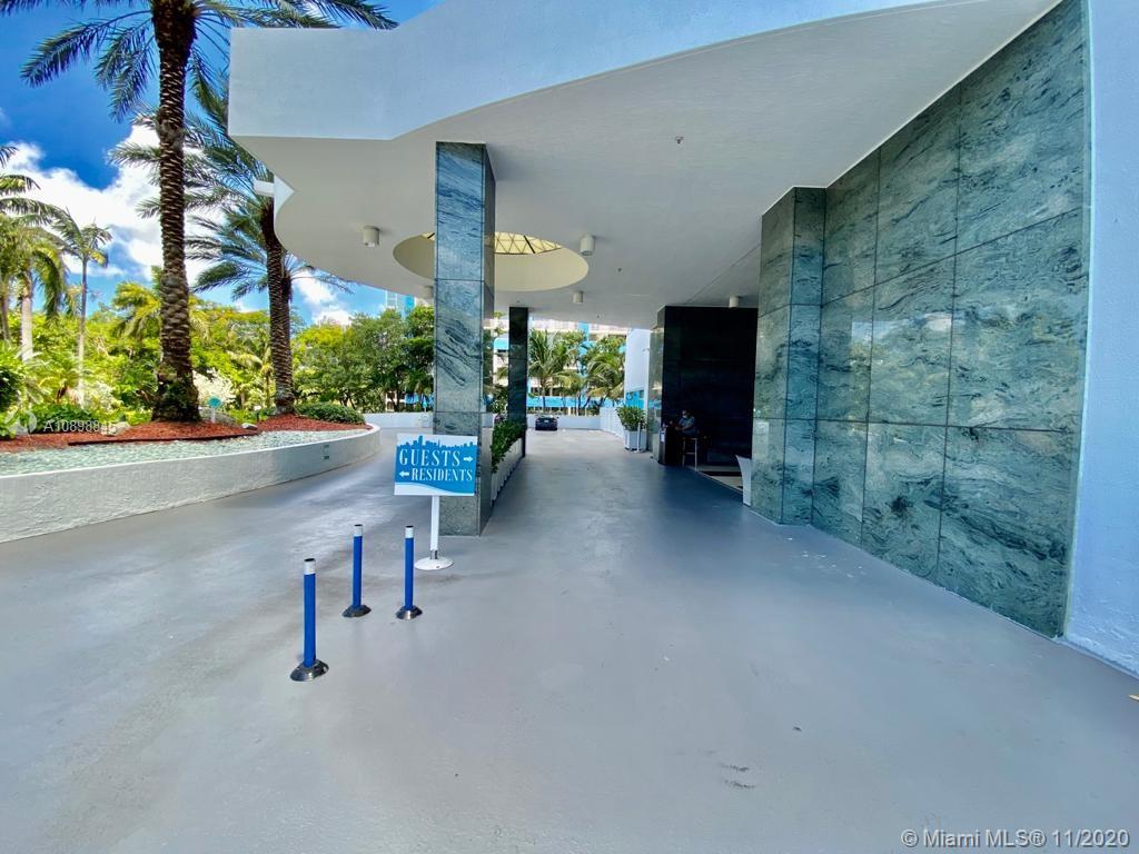 2101 Brickell Avenue, Unit 2002 Miami, FL 33129 - Photo 25 of 26 an outdoor space with patio furniture and potted plants