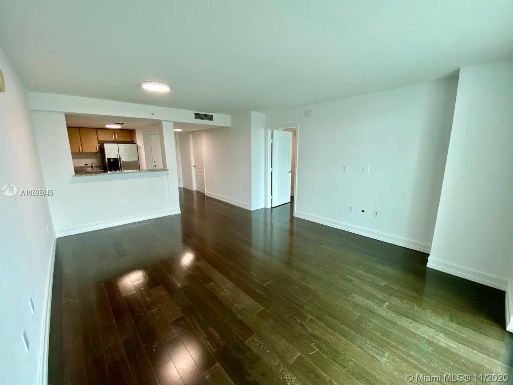 2101 Brickell Avenue, Unit 2002 Miami, FL 33129 - Photo 5 of 26 a view of a room with wooden floor