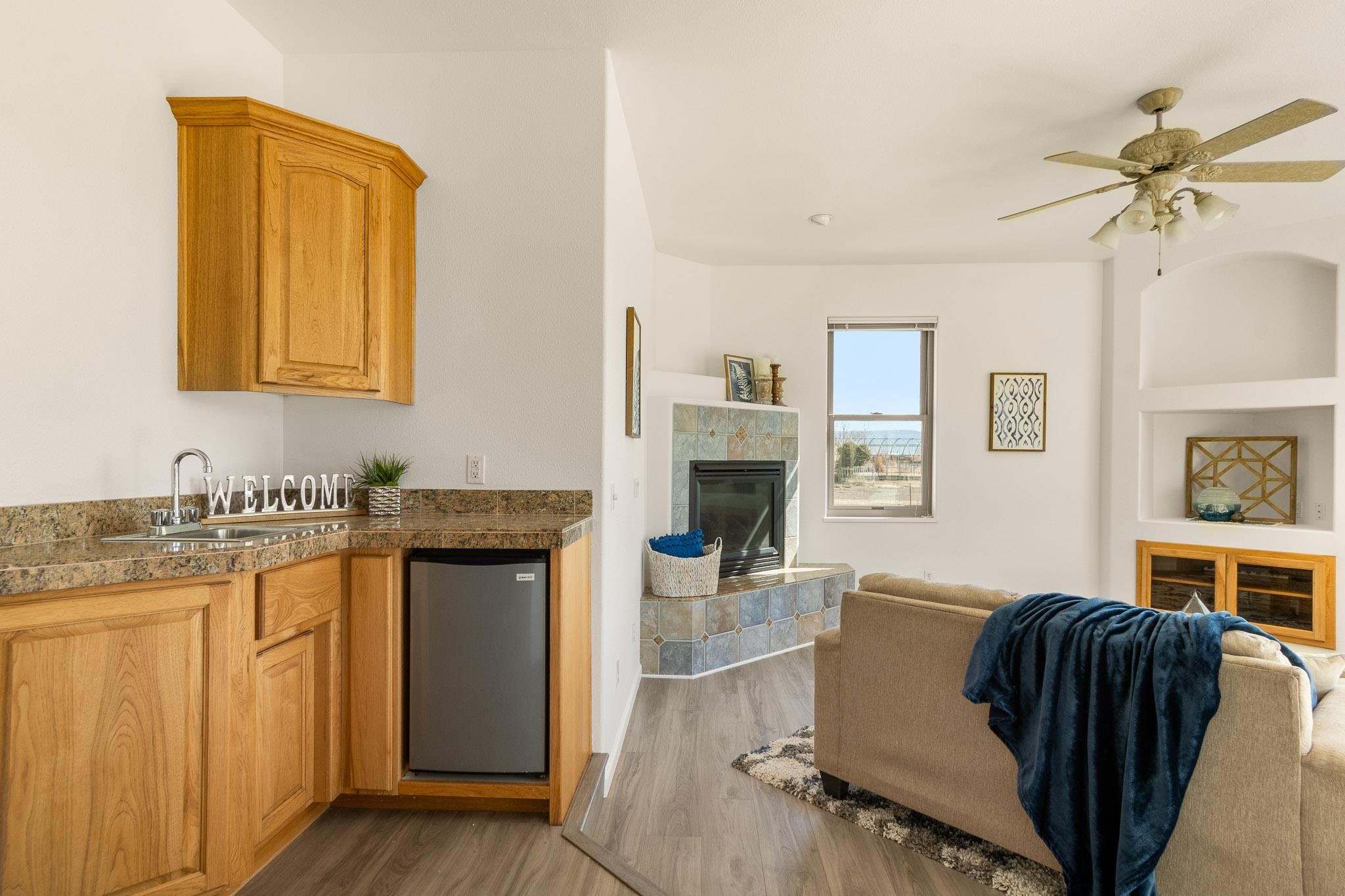 2107 I I- 1/2 Road Grand Junction, CO 81505 - Photo 17 of 42 a living room with furniture and a fireplace