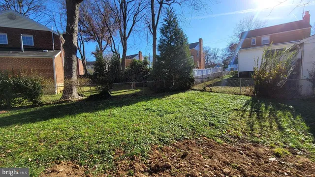 a view of a backyard with garden