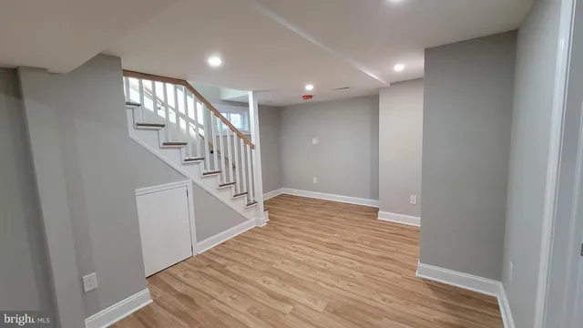 a view of entryway with wooden floor