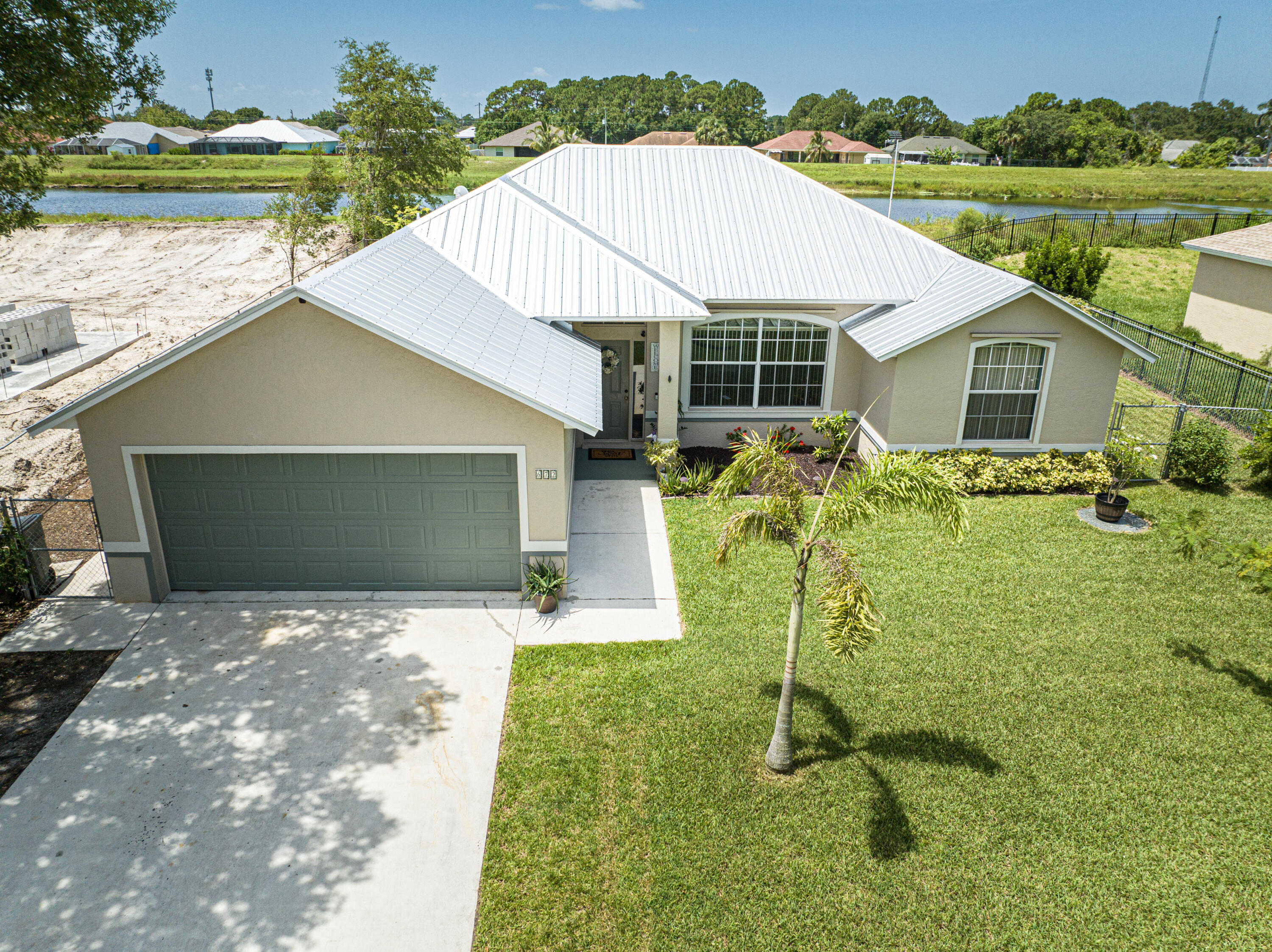 672 Southwest Aster Road Port St. Lucie, FL 34953 - Photo 1 of 43 Front