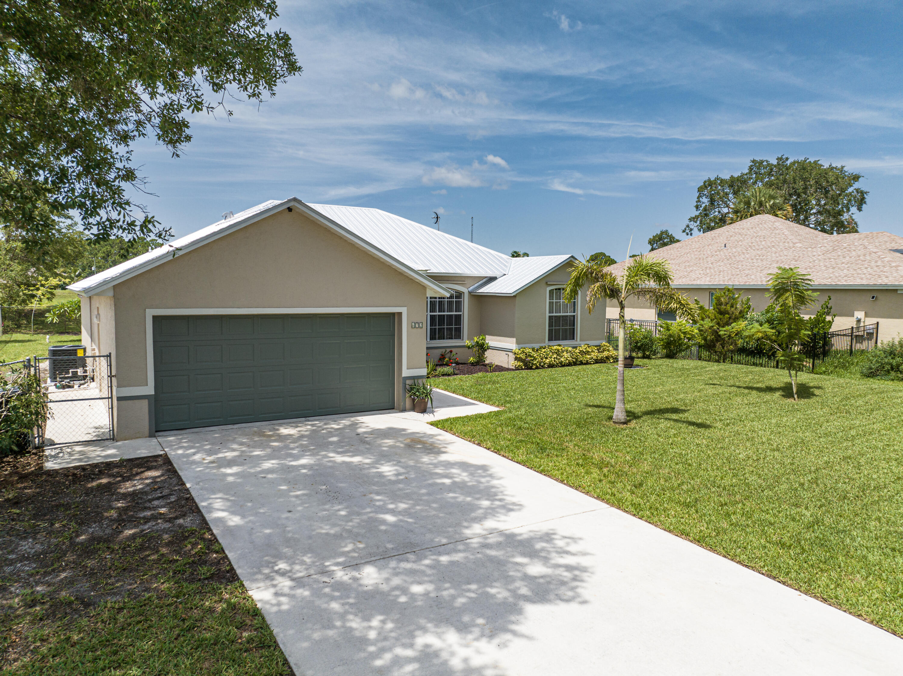 672 Southwest Aster Road Port St. Lucie, FL 34953 - Photo 38 of 43 Front