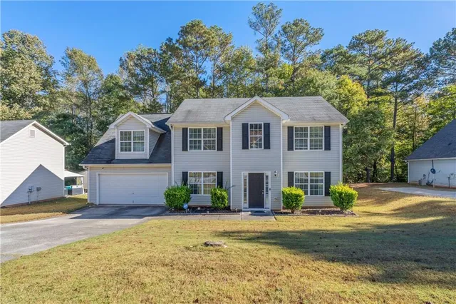 a view of a house with a swimming pool