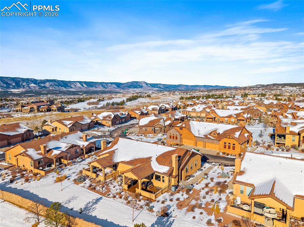12988 Cupcake Heights Colorado Springs, CO 80921 - Photo 31 of 39 an aerial view of residential building and ocean view